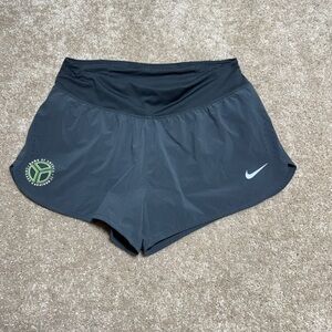 Nike Women's Black Athletic Running Shorts with Neon Green Logo